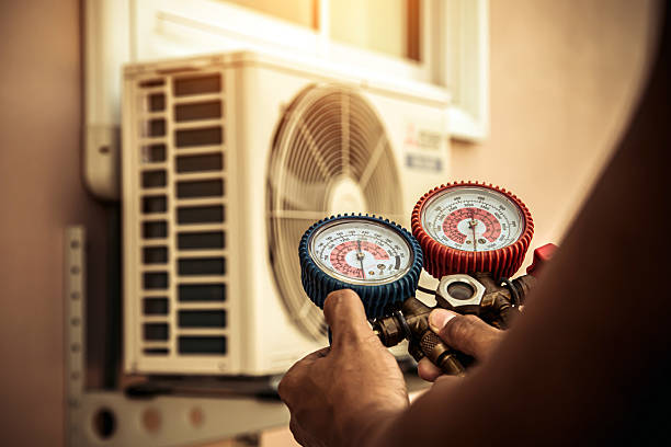 Professional Air Conditioning Service technician working in Lumberton, NC